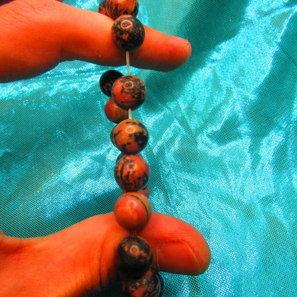 Rhodonite 10mm Round 7" Stretchy Gemstone Bracelet - Picture 3 of 3
